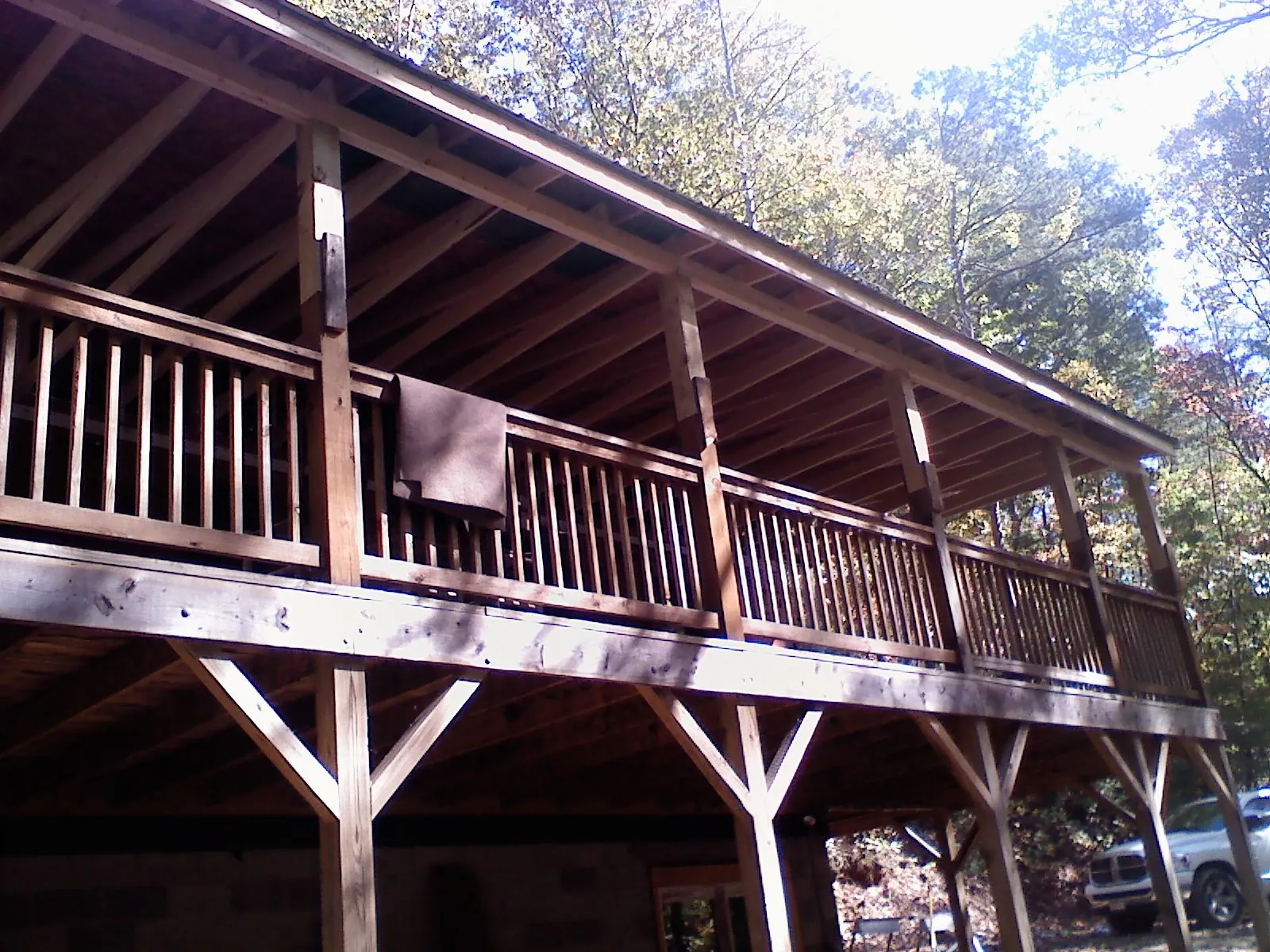 Timber framing under a new elevated porch and deck — Roof Leak Repair in Viewtown by Roofing Brothers
